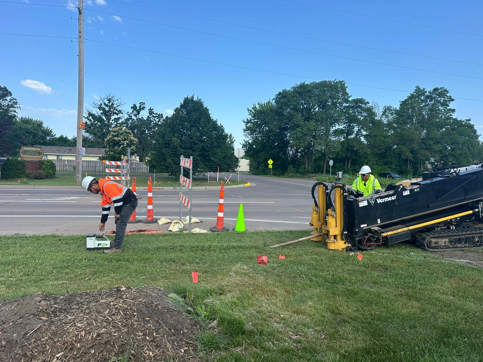 Eagle Drilling crew performing HDD road crossing with safety barriers